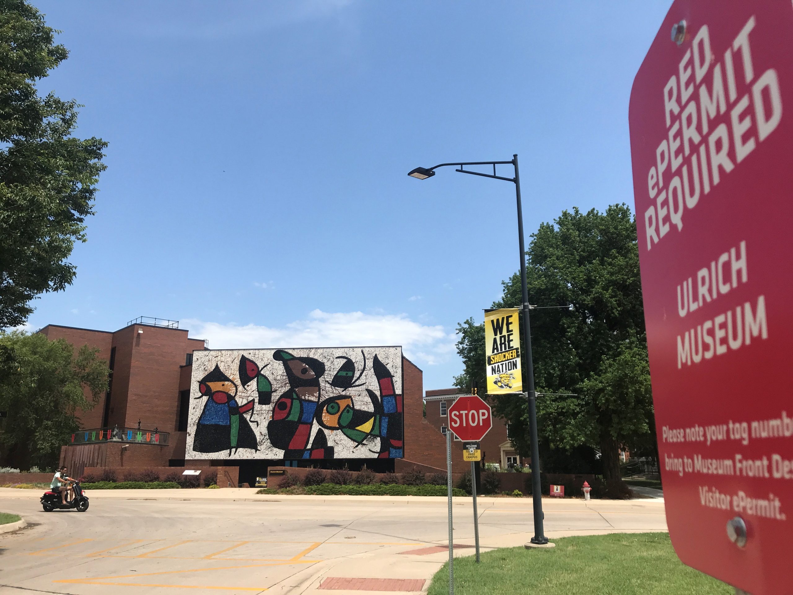 A stop sign on the side of a road