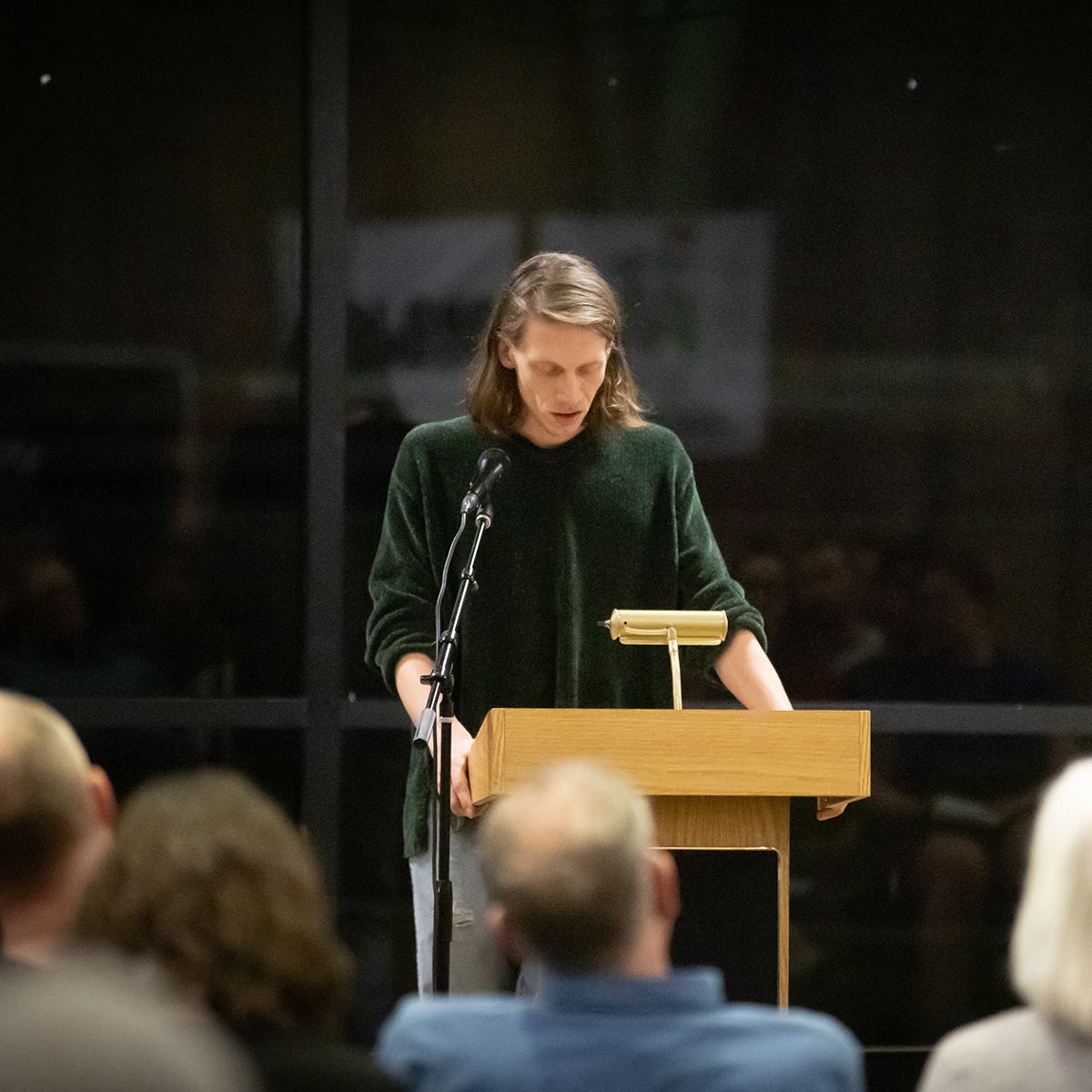 A person standing in front of an audience