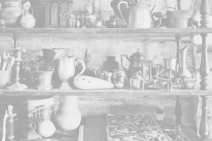 Many sentimental items appear on a shelf, including pitchers, vases, teacups, an ocarina, and art supplies