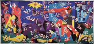 Many sports jerseys are sewn together into a quilt that is a version of Pablo Picasso's painting, Guernica.