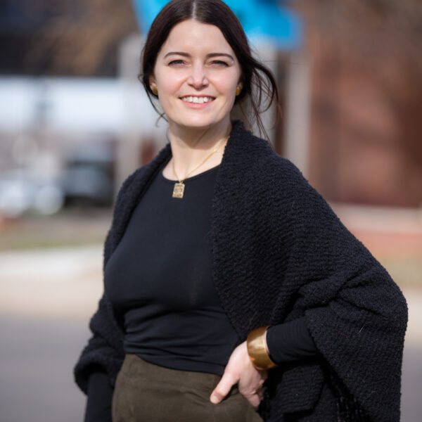Smiling brunette in black