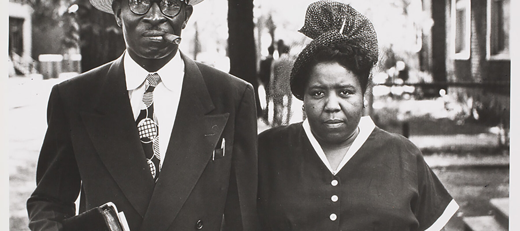 A man and woman are dressed for church.
